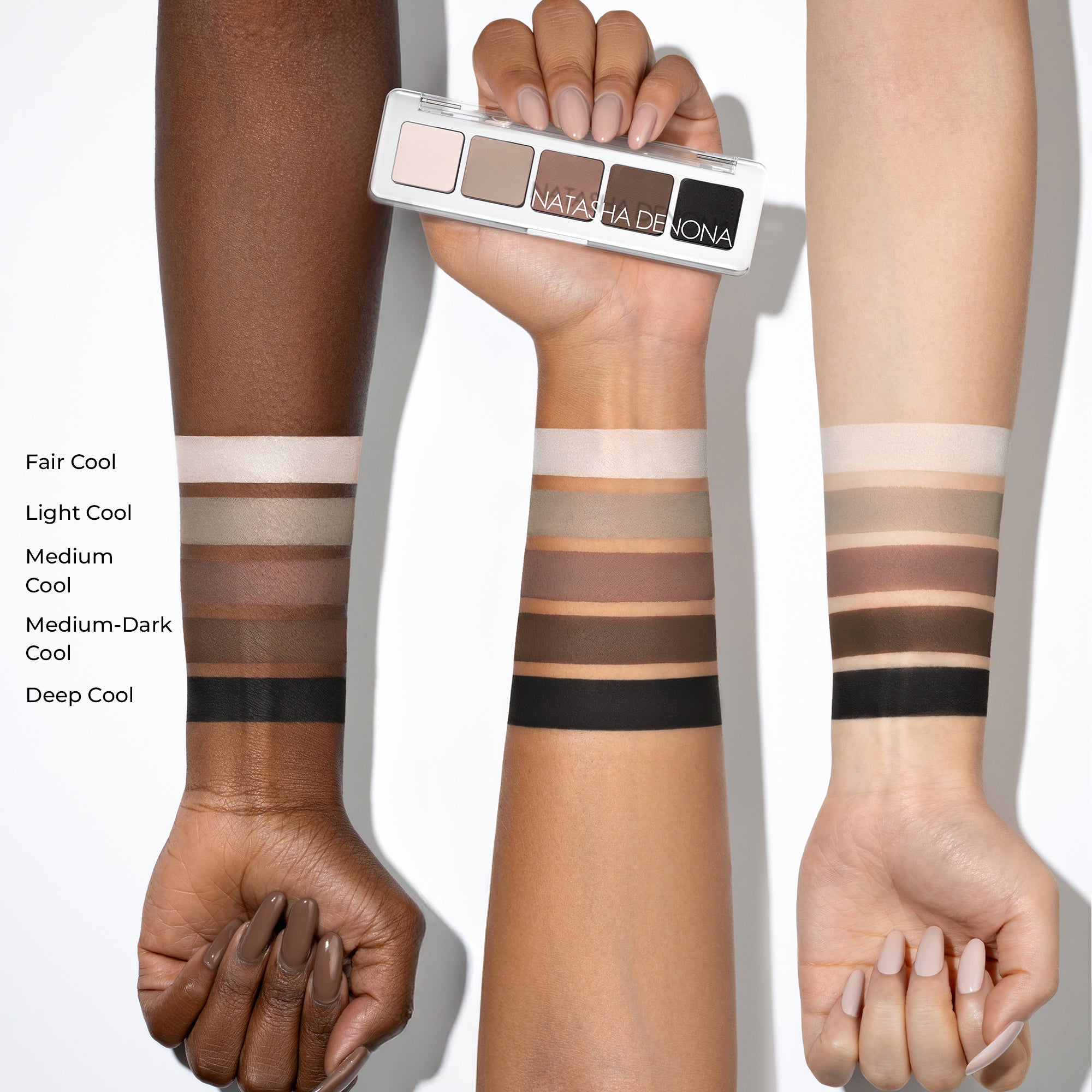 Mini Eye Sculpt Cool Eyeshadow Palette arm swatches on different skin tones.