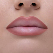 I Need a Nude Lip Crayon shade 'Nina' model look.