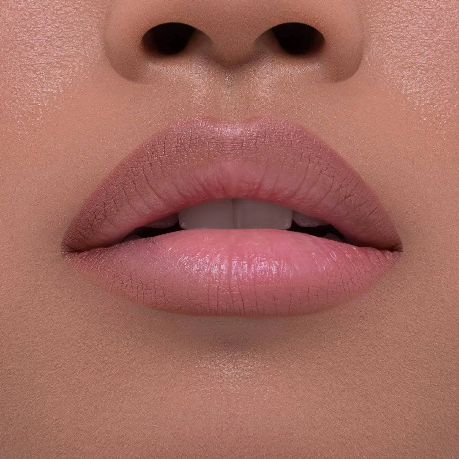 I Need a Nude Lip Crayon shade 'Nina' model look.
