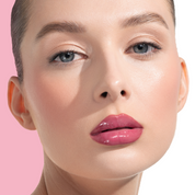 HY-GLOSS in shade 'Berry Pop' model look on a light-pink and white background.